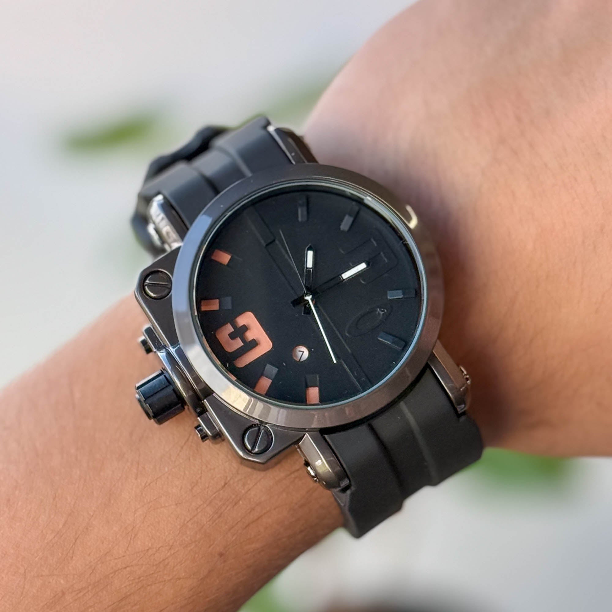 RELOJ 0KL3Y GOMA NEGRO X NARANJA HOMBRE