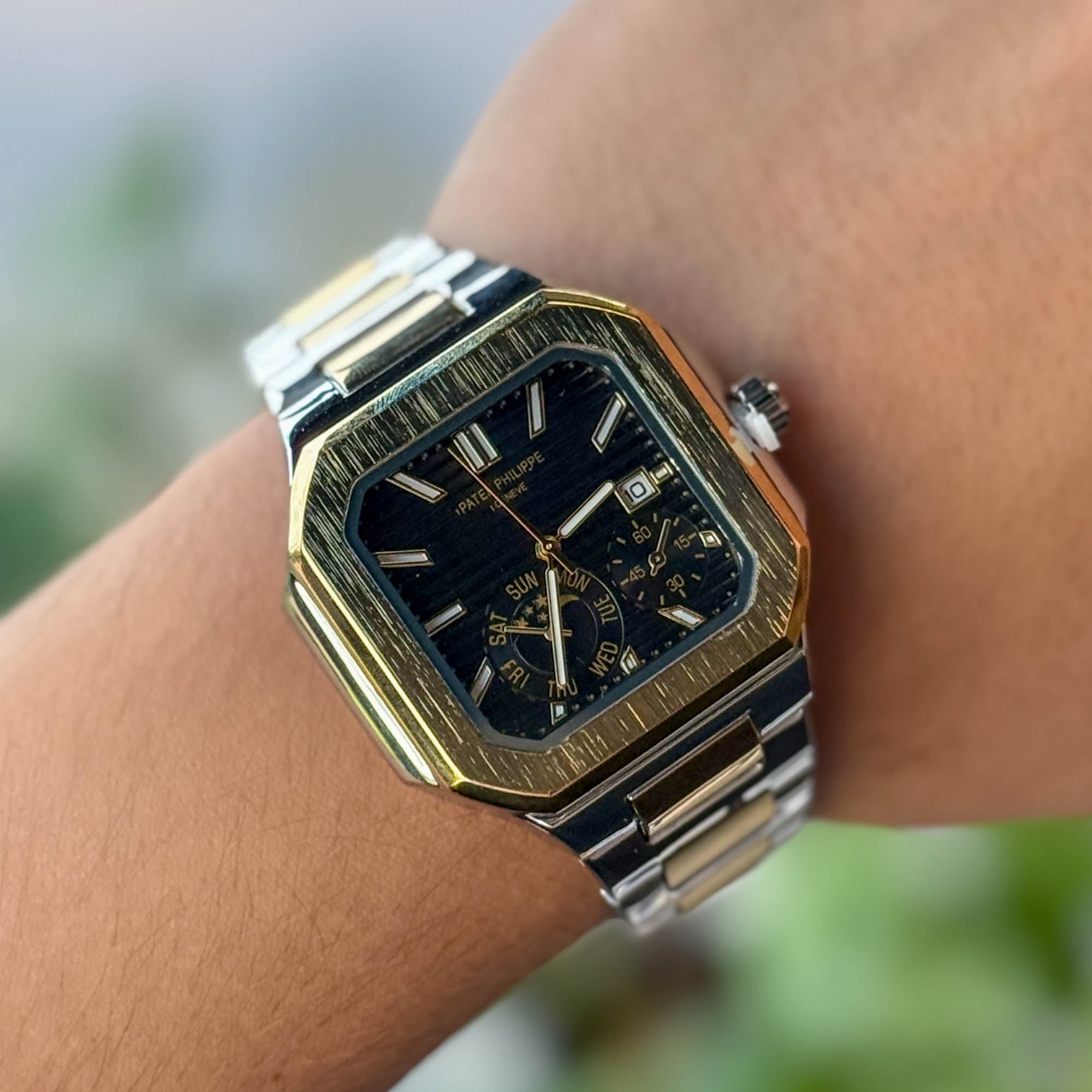 RELOJ P4T3K METALICO BICOLOR FONDO NEGRO  HOMBRE