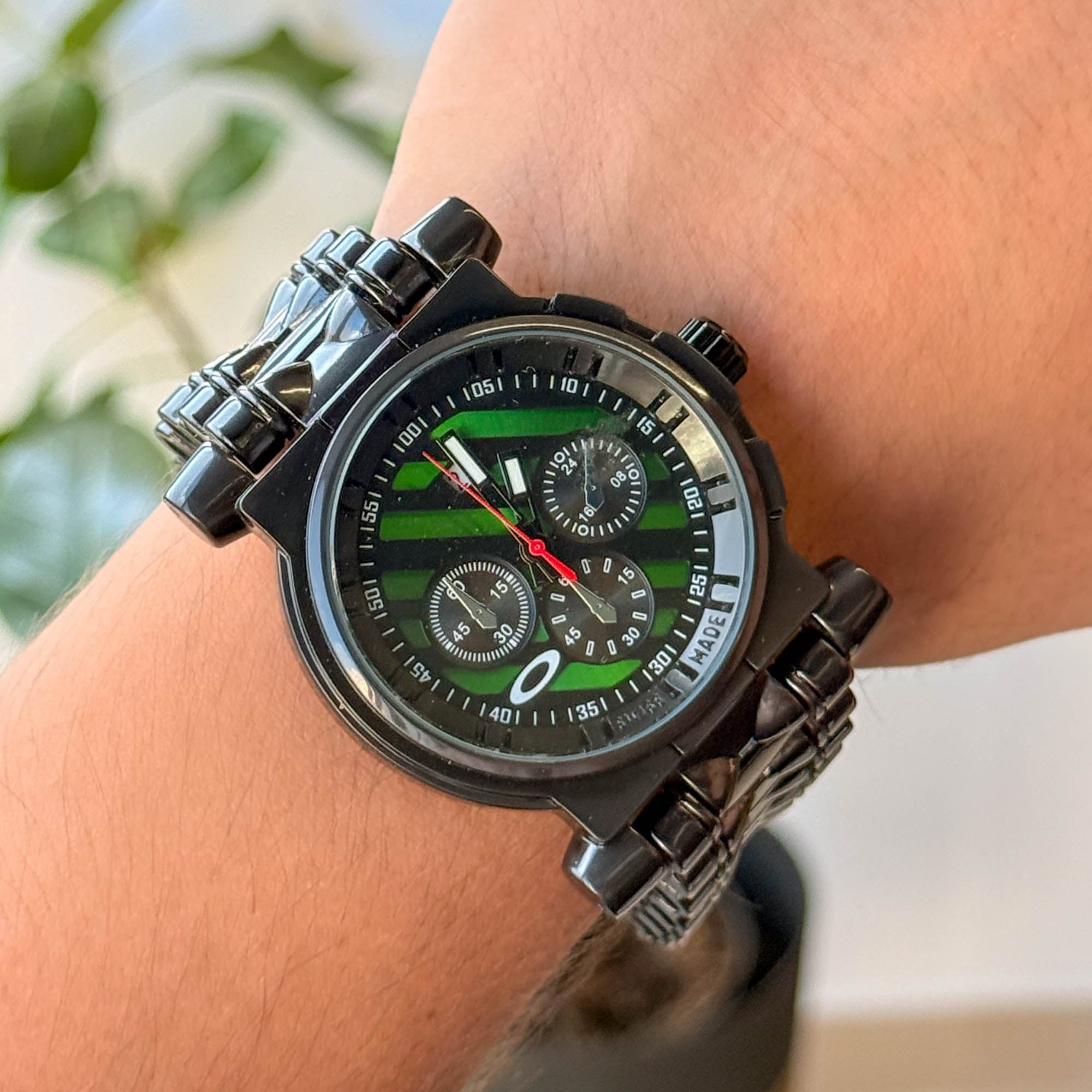 RELOJ 0KL3Y  METALICO NEGRO X VERDE  HOMBRE