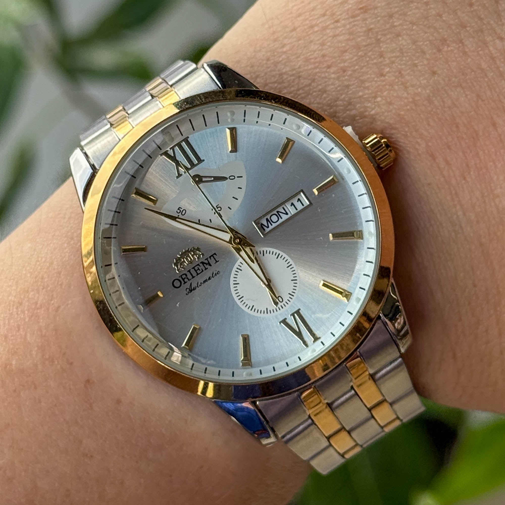 RELOJ 0R1ENT BICOLOR FONDO BLANCO  HOMBRE