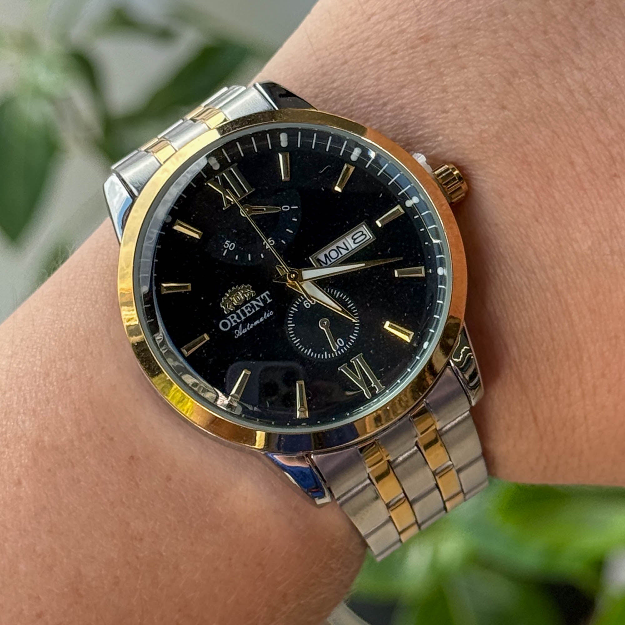 RELOJ 0R1ENT BICOLOR FONDO NEGRO  HOMBRE