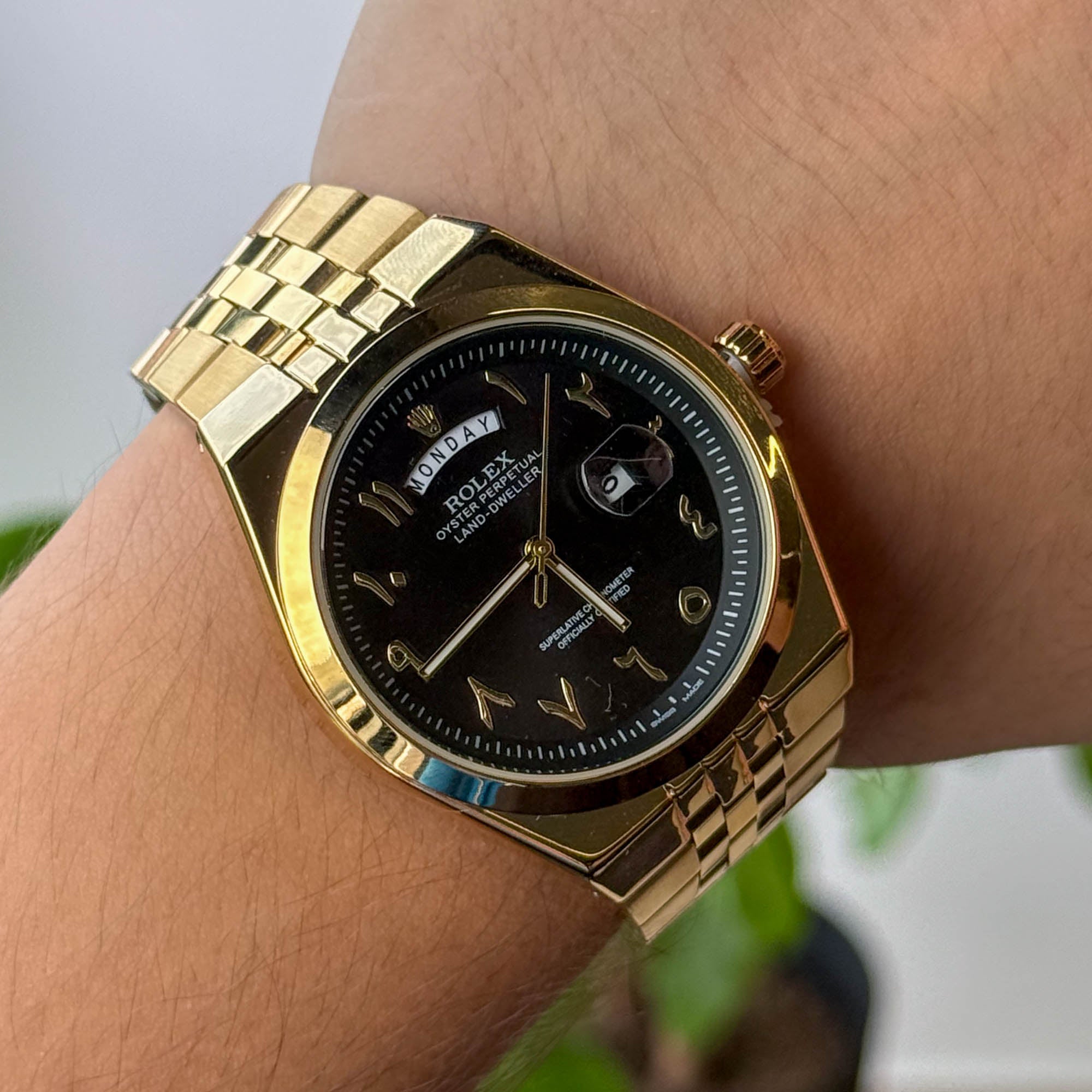 RELOJ R0L3X DORADO  FONDO NEGRO HOMBRE