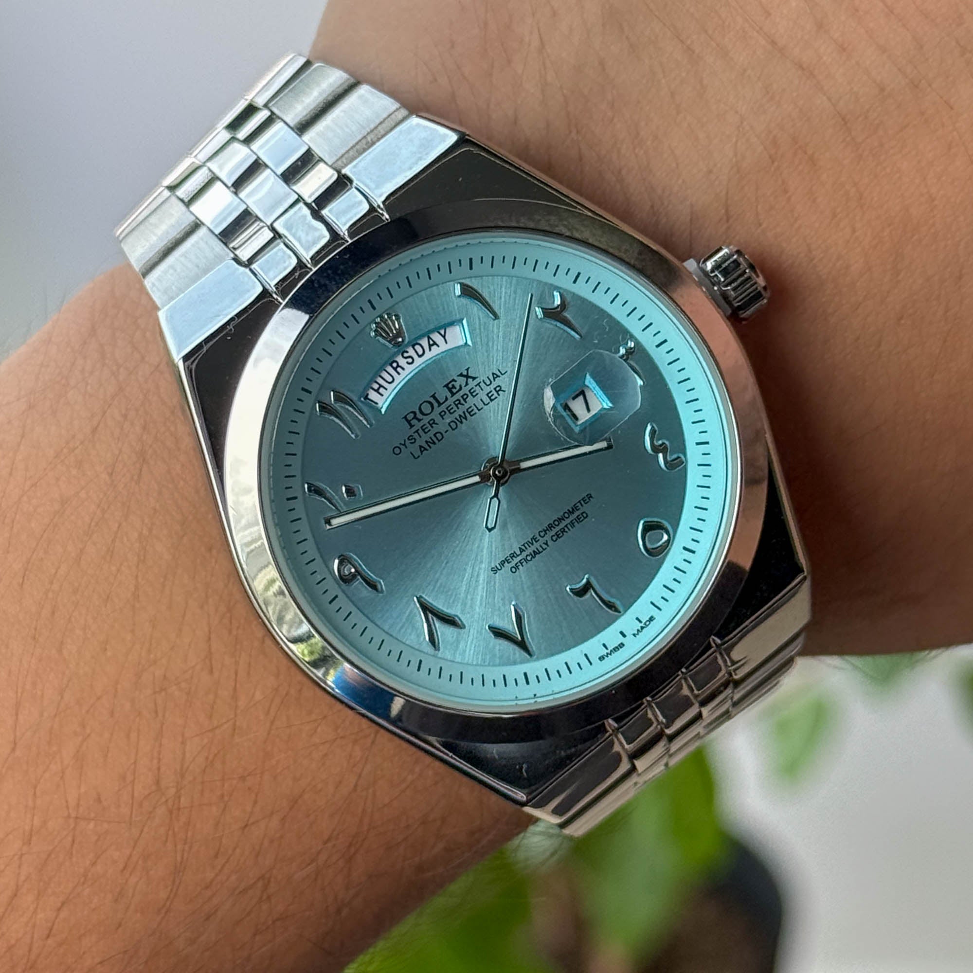 RELOJ R0L3X PLATEADO  FONDO CELESTE  HOMBRE