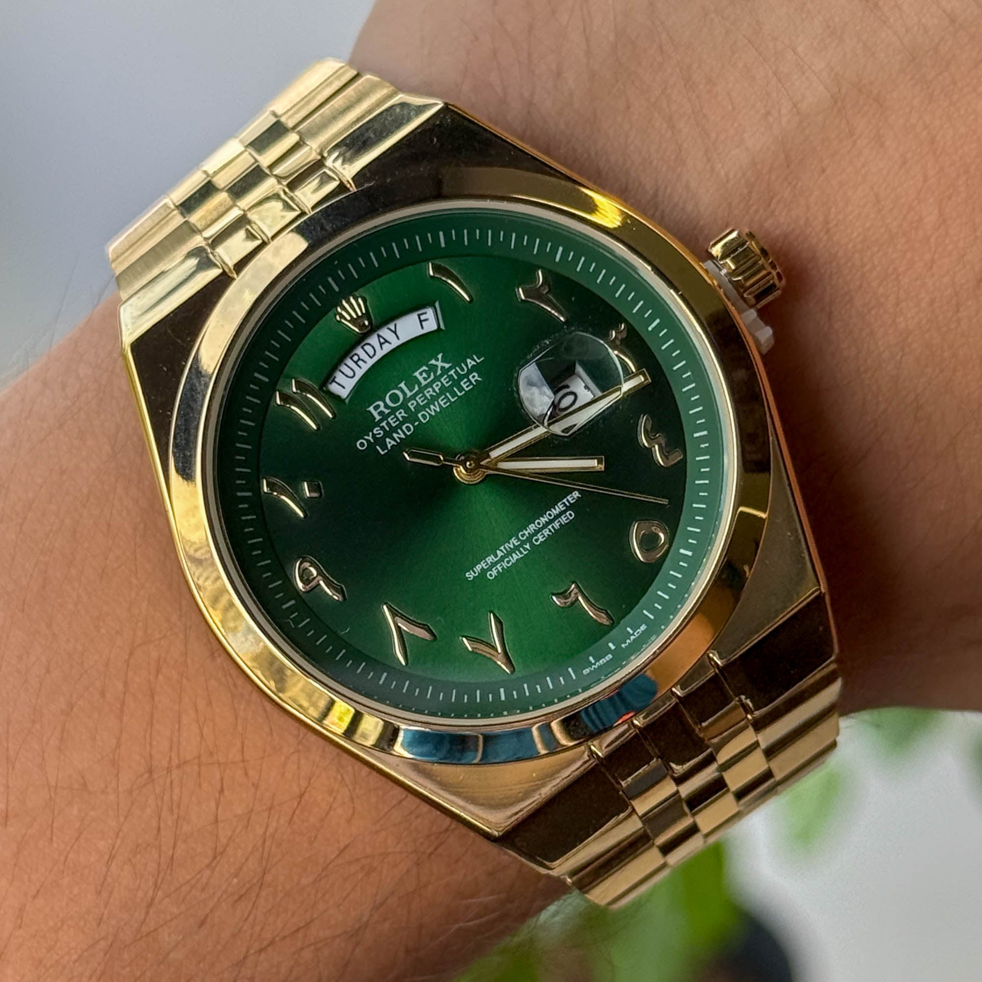 RELOJ R0L3X DORADO FONDO VERDE  HOMBRE