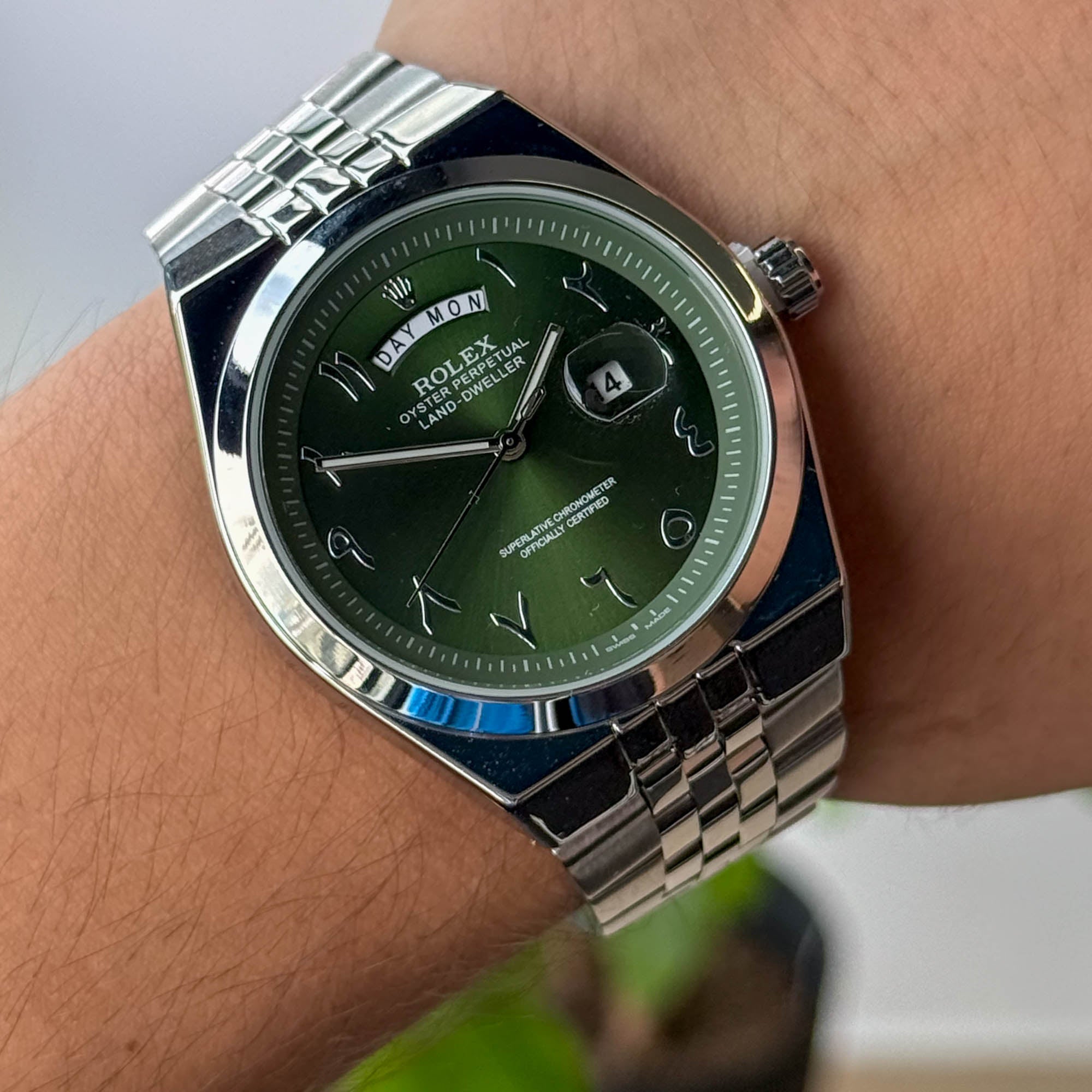 RELOJ R0L3X PLATEADO  FONDO VERDE  HOMBRE